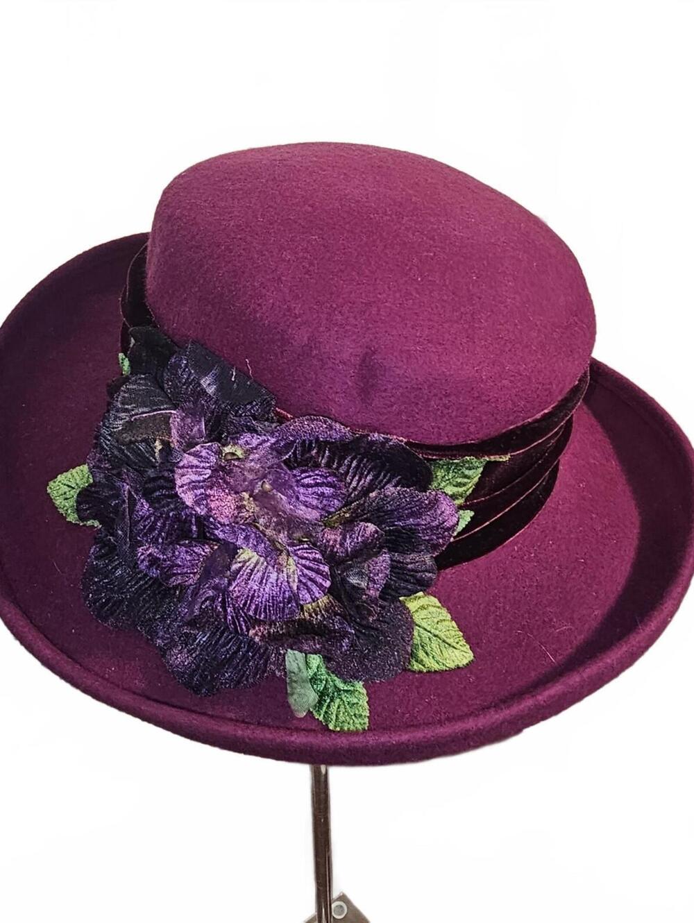 Purple felt hat with floral trim